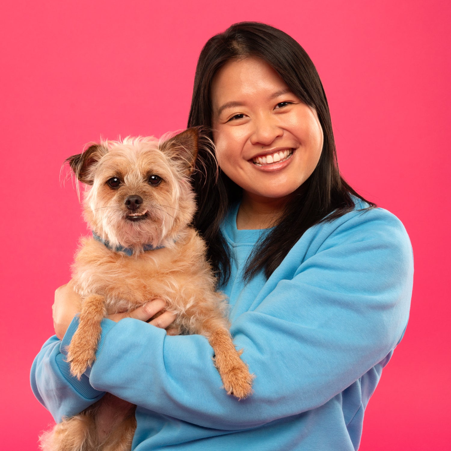 Founder Meagan holding her dog Korra
